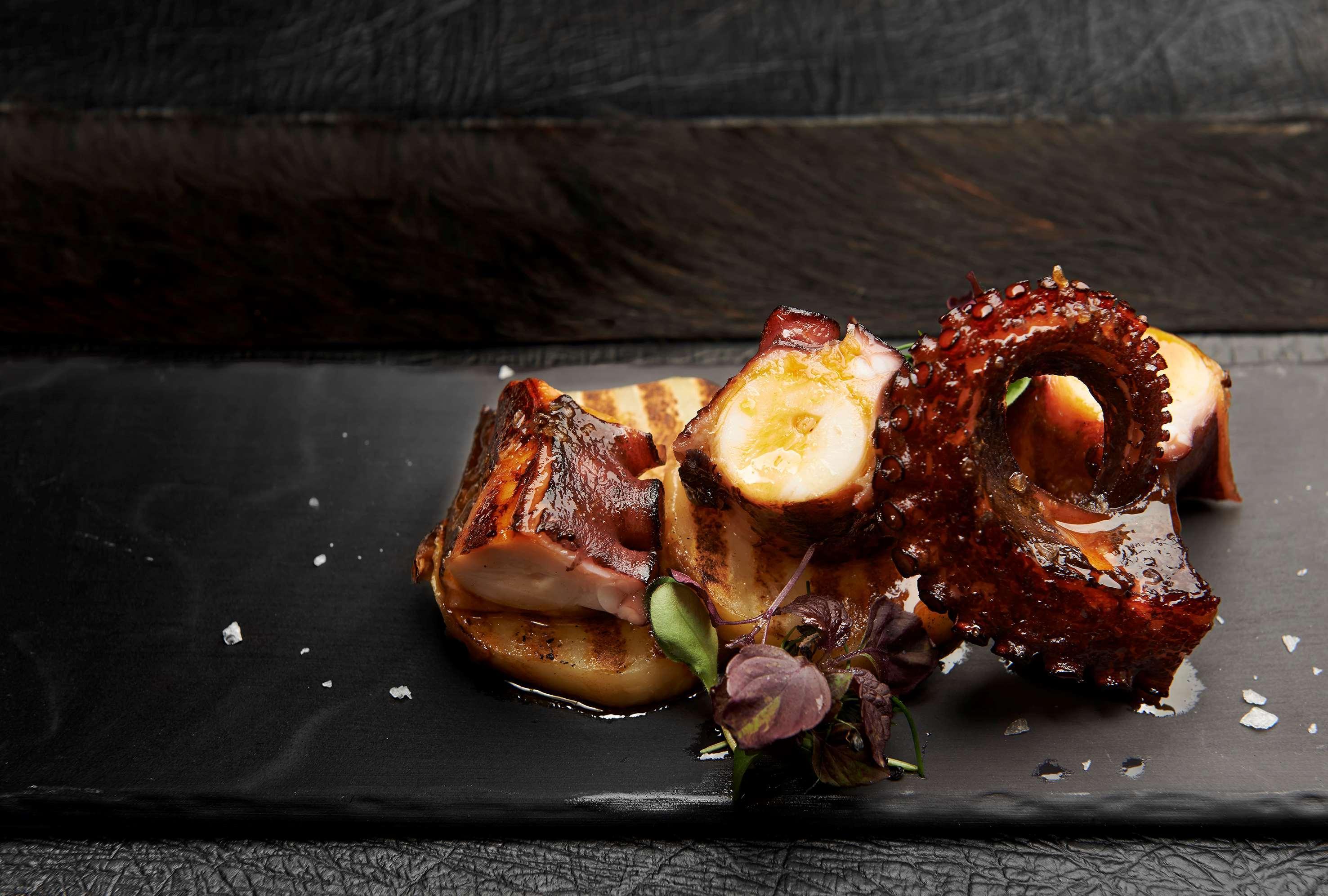 Hotel Victoria Gran Melia PMI Exteriör bild "A dish of grilled octopus and potatoes"